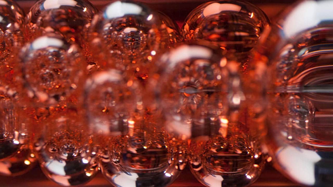 capillary-flow-tube-orange-transport-phenom (3) A close-up view of the Capillary Flow Experiments-2 Vane Gap-1 vessel.