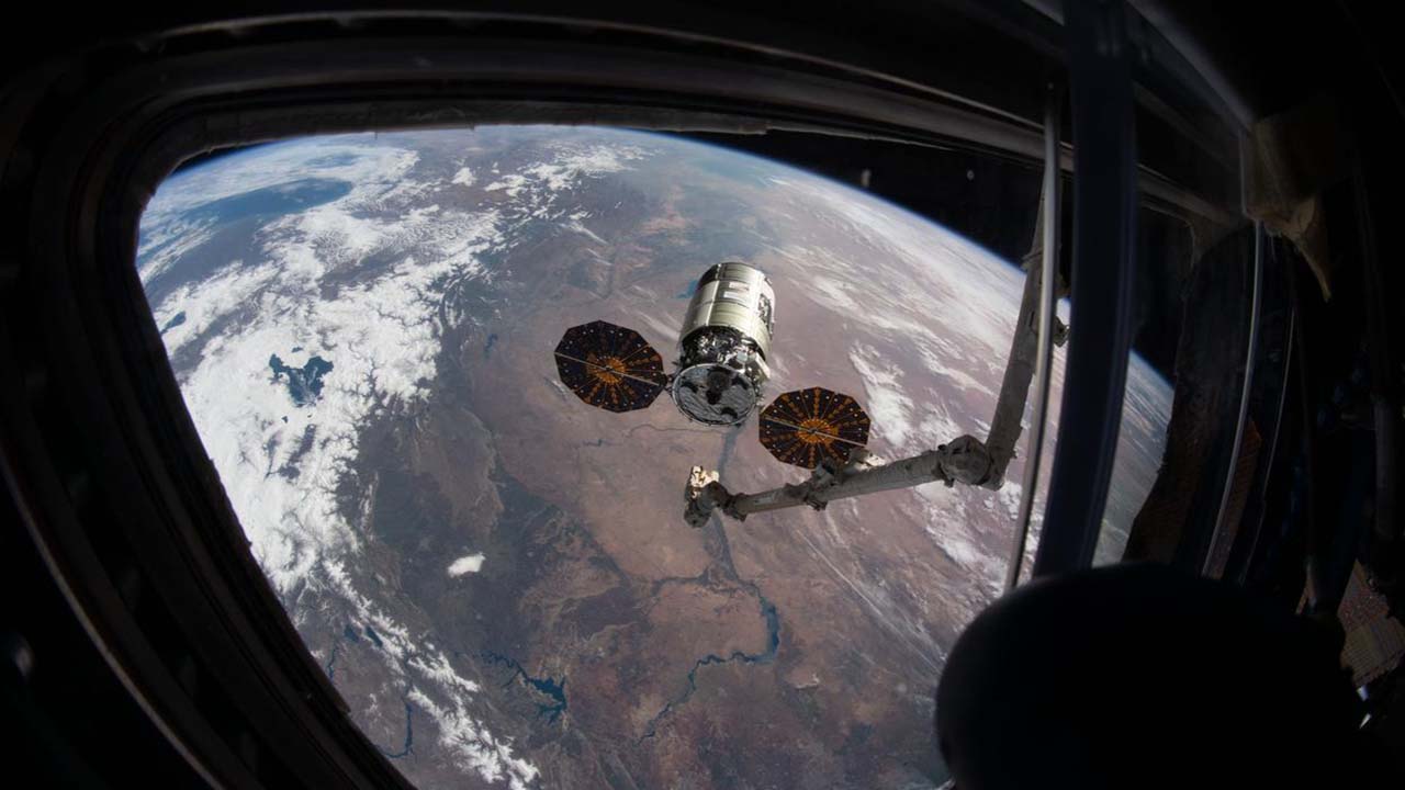 The Cygnus space freighter from Northrop Grumman is pictured moments before its capture with the Canadarm2 robotic arm in February 2021