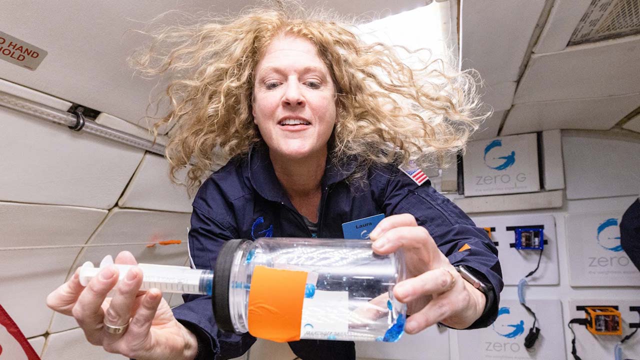 Space Station Ambassador and educator, Laura Tomlin participating in a reduced gravity flight as part of the Embedded Teachers Program