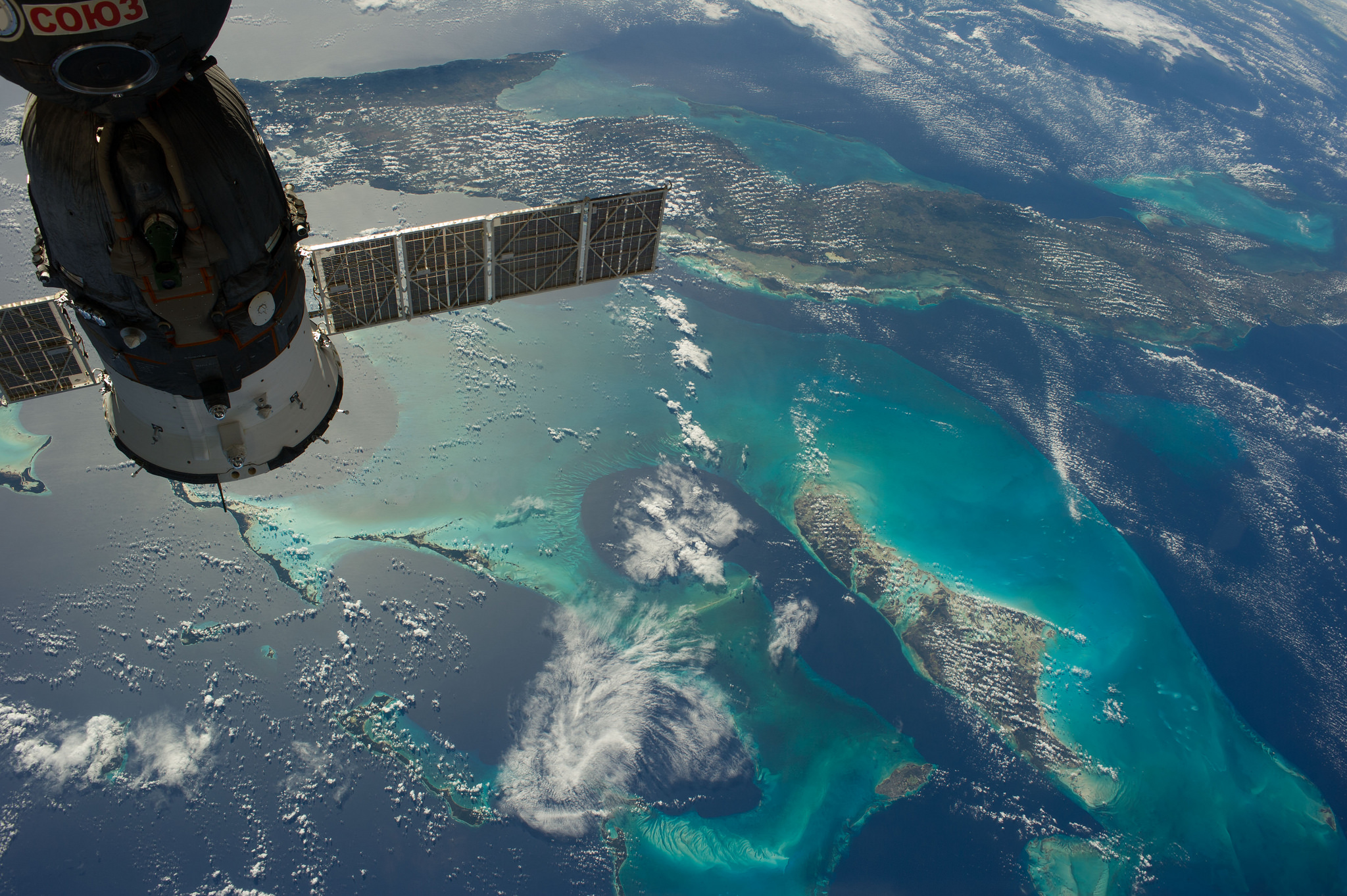 The Caribbean country of Cuba appears at the top of this high oblique image, photographed by one of the Expedition 38 crew members aboard the International Space Station. Andros Island, part of the Bahamas, is in the bottom of the frame.