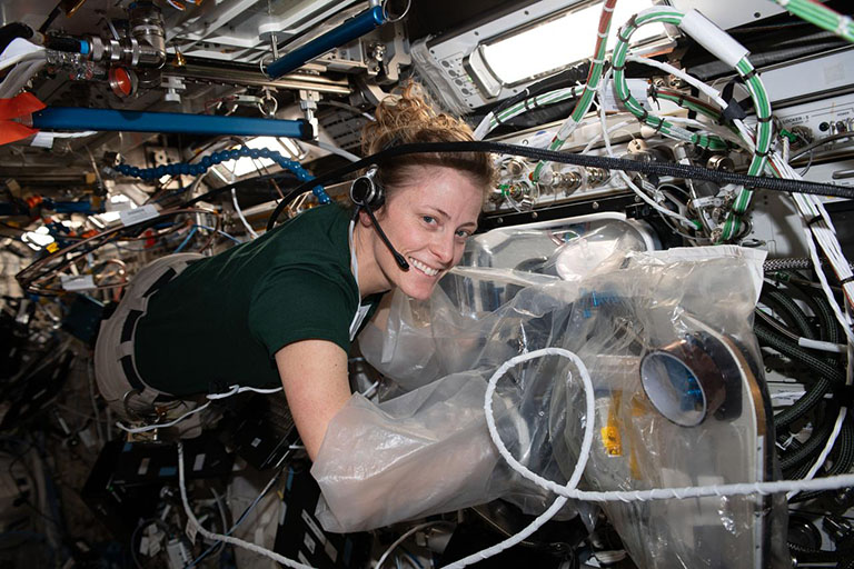NASA astronaut Loral OHara works on the BioFabrication Facility (BFF).