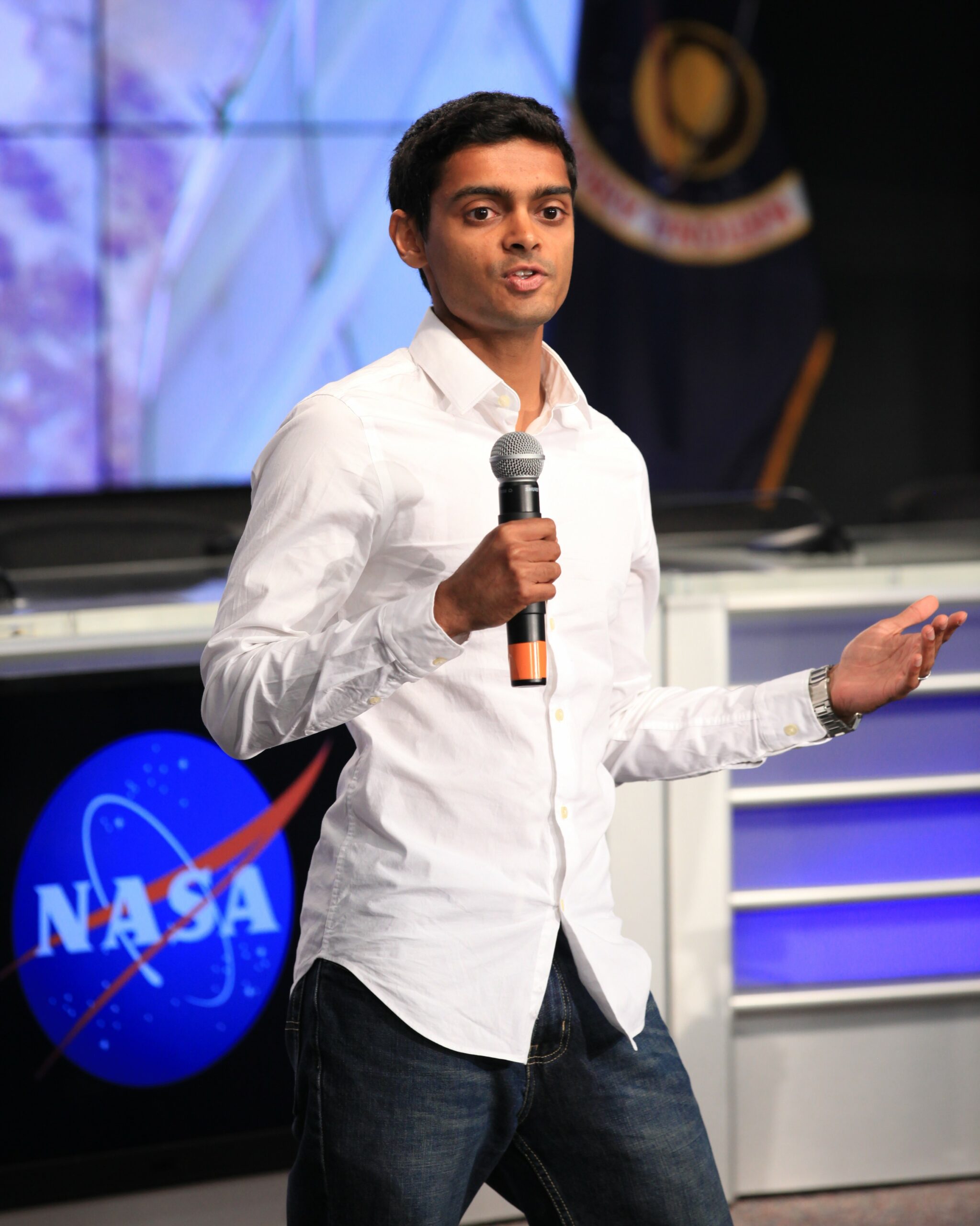 Arun Sharma speaking at the SpaceX CRS 9 NASA science briefing.
