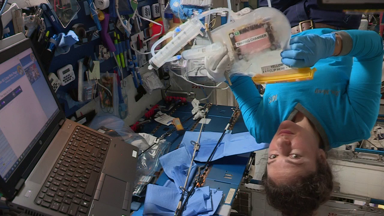 NASA astronaut Jessica Meir thawing osteoblast cell cultures utilizing BioServe designed BioCells and thawing system in support of the ISS National Lab sponsored OsteoOmics 2 experiment.