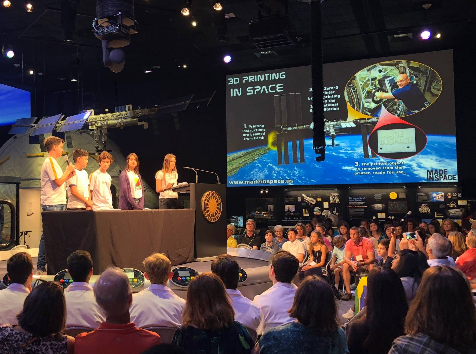 The winning SSEP group from Brazil giving a presentation in Washington D.C. (students from Dante Alighieri, Emef Perimetral, Project Âncora) in Brazils first year of SSEP participation.