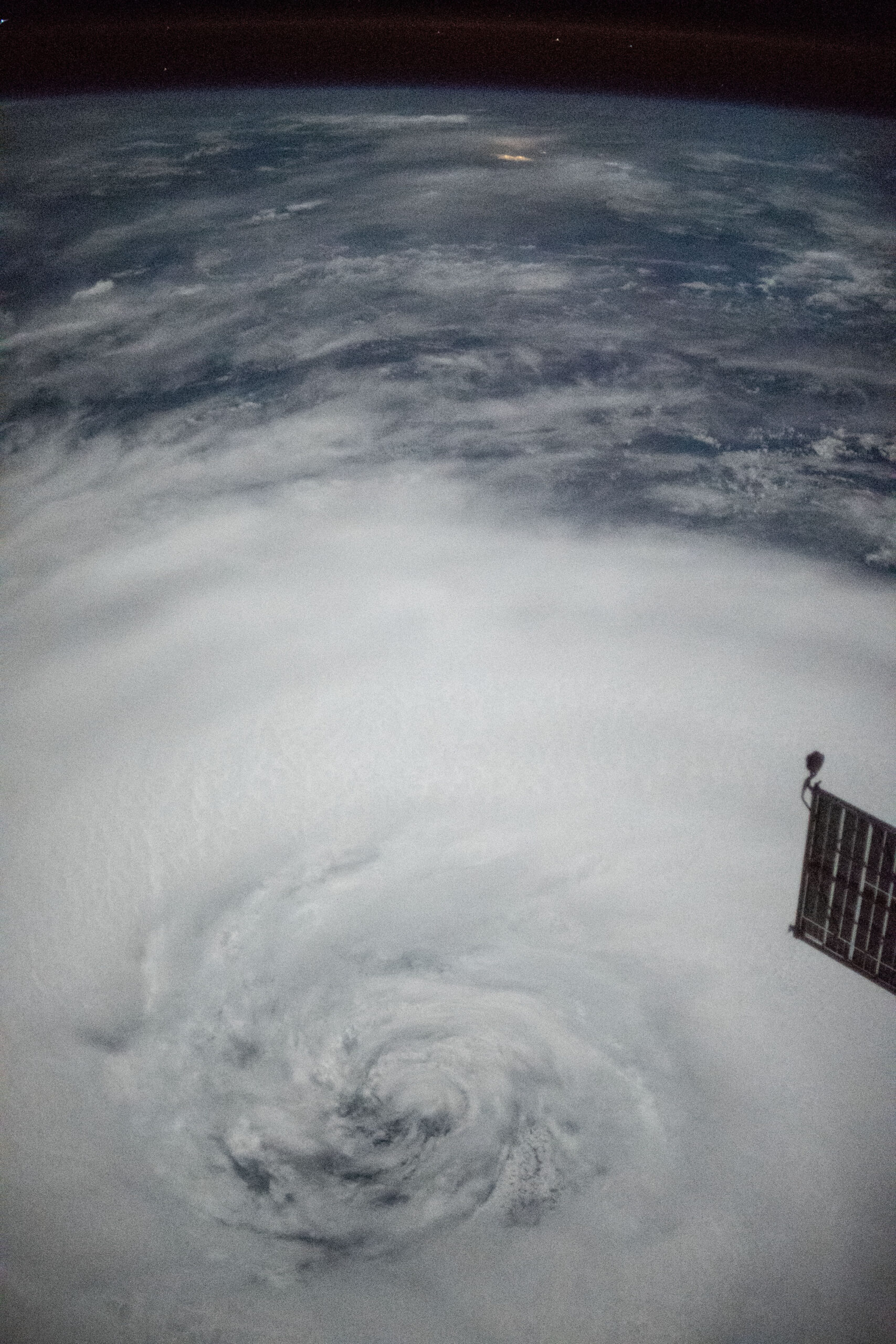 Image of Super Typhoon Trami illuminated by the full moon taken from the International Space Station as part of the CyMISS project.
