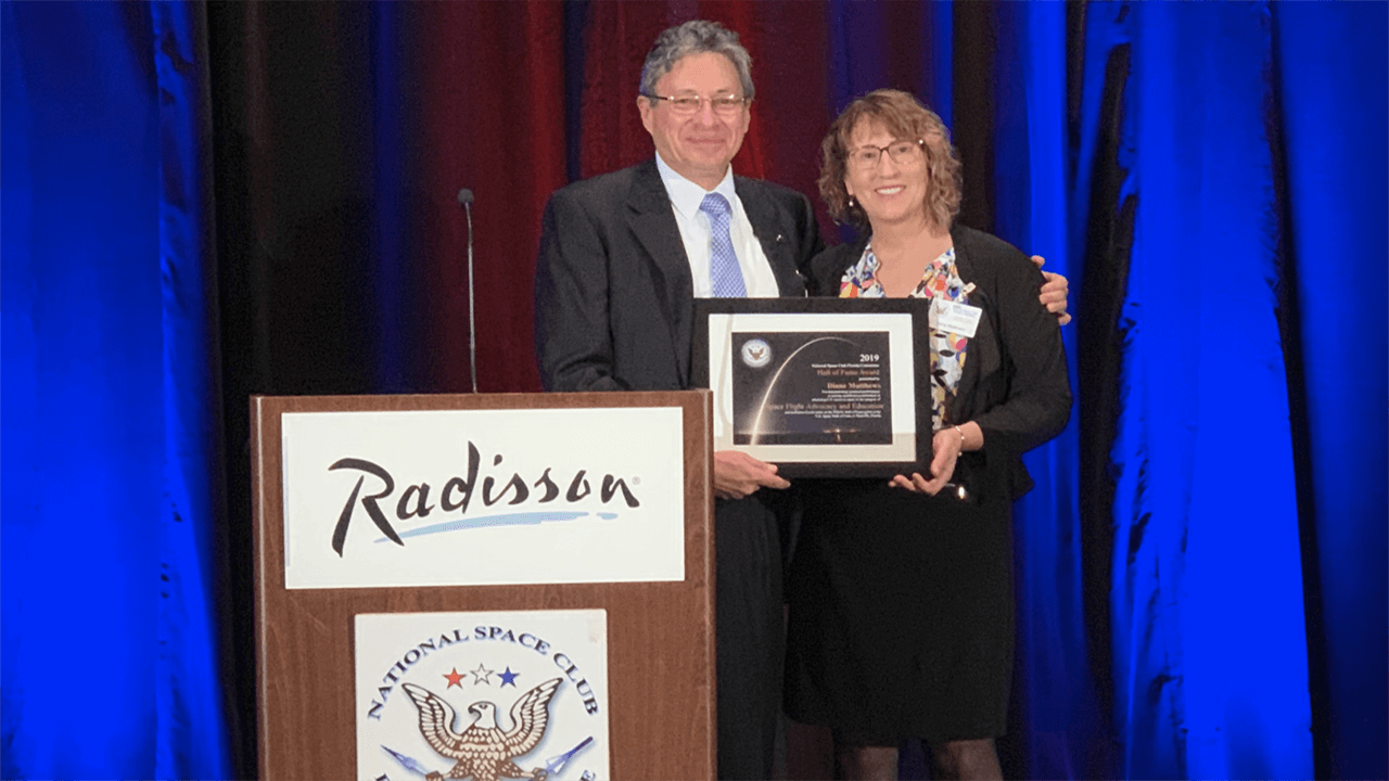 ISS National Lab Education Project Manager Diane Matthews is presented with a Space Worker Hall of Fame award from the National Space Club Florida Committee.