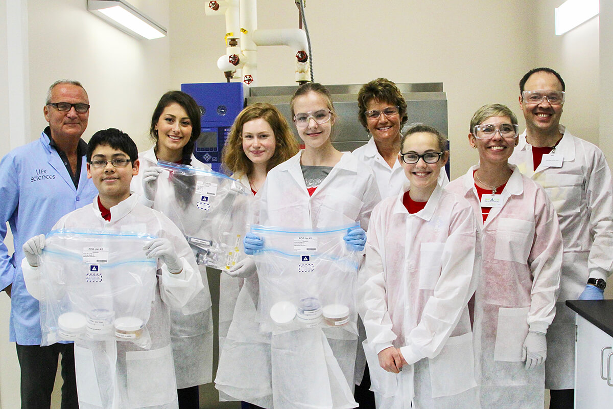 Dr. Ilia Guzei (far right) and the 2018 Wisconsin Space Crystals team at the Space Life Sciences Laboratory at Kennedy Space Center preparing their samples for launch.