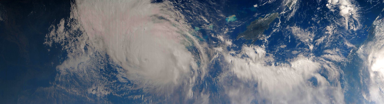 This is a color mosaic of Hurricane Irma created using a long sequence of images acquired from the ISS on September 10, 2017 just as the eye of the storm was hitting the Florida Keys. This mosaic stretches from the Mississippi River on the left, over Hurricane Irma (which is covering Florida and Cuba) and across the Caribbean (with Hispaniola and Puerto Rico visible near the top just right of center) to the northern coast of South America.