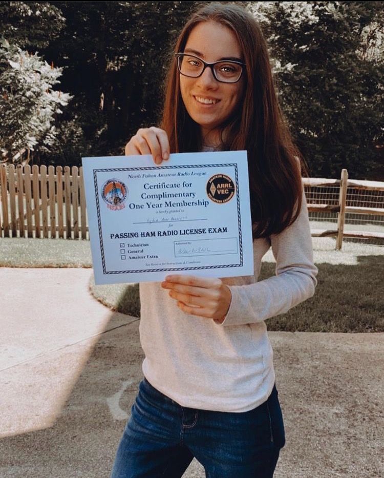Lydia Bennett with her Ham Radio Technician license.