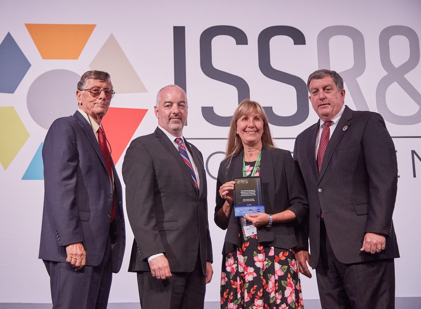 Mary Kearns Jonker receives a 2018 International Space Station Compelling Results Award in Biology and Medicine.