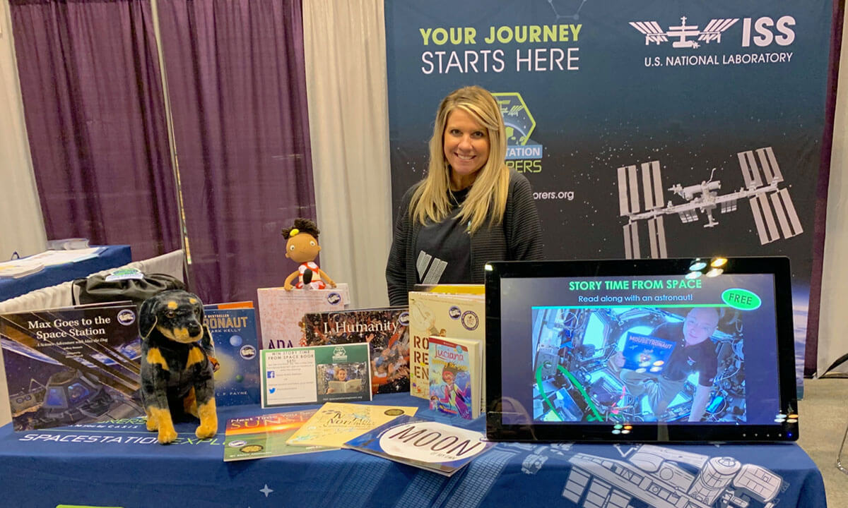 Erica Parsell at the Space Station Explorers booth at NSTA 2019.