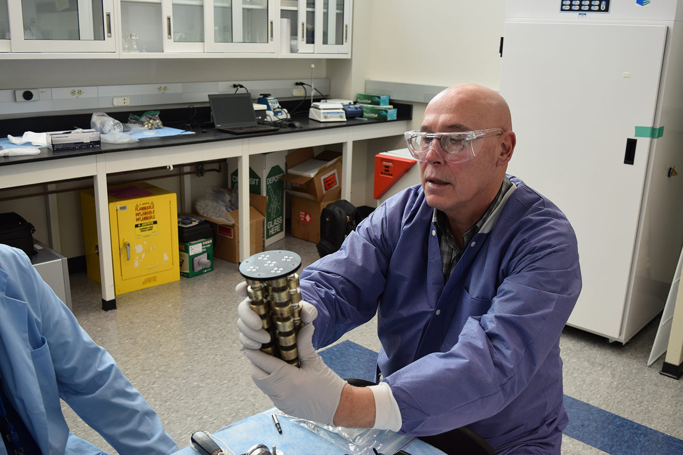 Paul Reichert preparing the Protein Crystallization Facility hardware prior to SpaceX CRS 10.