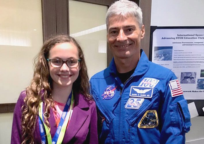 Payton Kelly Van Domelen met NASA astronaut Mark Vande Hei at the 2018 ISS Research & Development conference.