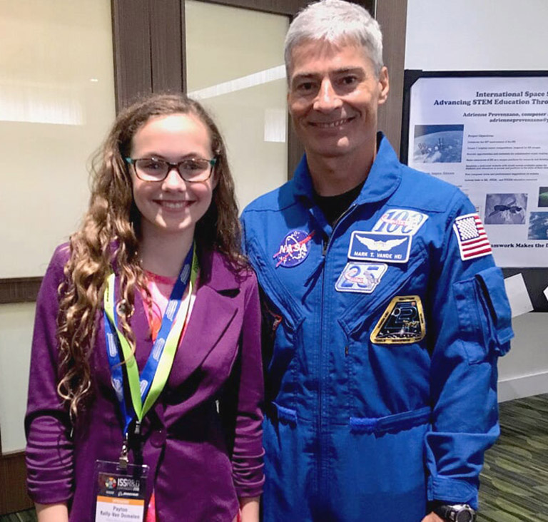 Payton Kelly Van Domelen met NASA astronaut Mark Vande Hei at the 2018 ISS Research & Development conference.