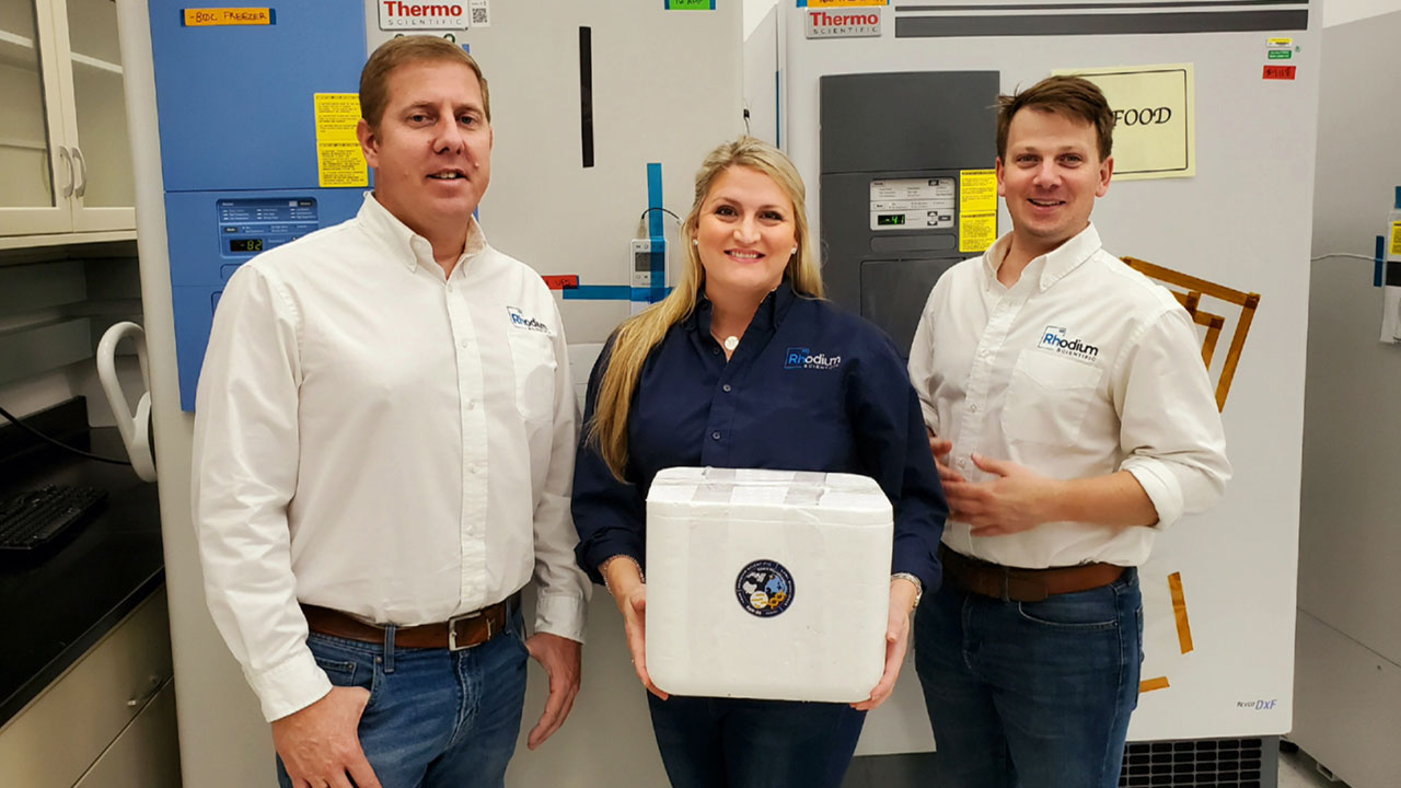 The Rhodium Scientific team turns over Space Microbiome samples to NASA at Kennedy Space Center prior to SpaceX CRS 20 launch (left to right: Heath J. Mills, Olivia G. Holzhaus, R.P. Oates)