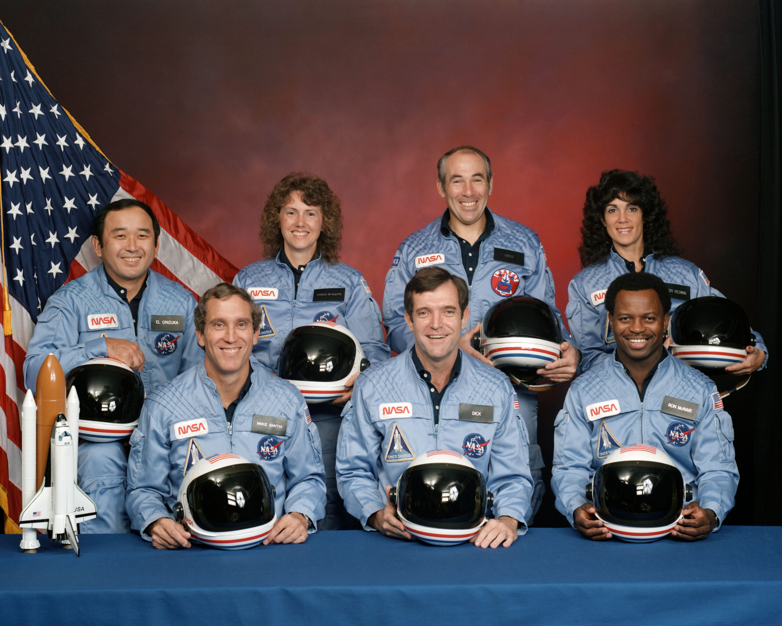 On Jan. 28, 1986, the seven Challenger crew members lost their lives following an explosion during the launch phase of the STS 51L mission. Challenger crew members are (left to right, front row) astronauts Michael J. Smith, Francis R. (Dick) Scobee and Ronald E. McNair; Ellison S. Onizuka, Sharon Christa McAuliffe, Gregory Jarvis and Judith A. Resnik. McAuliffe and Jarvis are payload specialists, representing the Teacher in Space Project and Hughes Company, respectively.