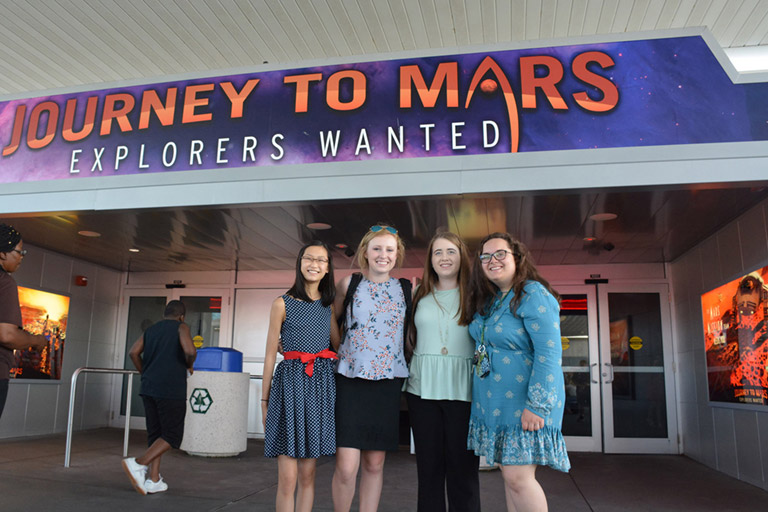 3. Student teams presented their projects to the public on a stage surrounded by Journey to Mars exhibits. This team from Kentucky is made up of the top scoring students from multiple schools that participated in the <a href=