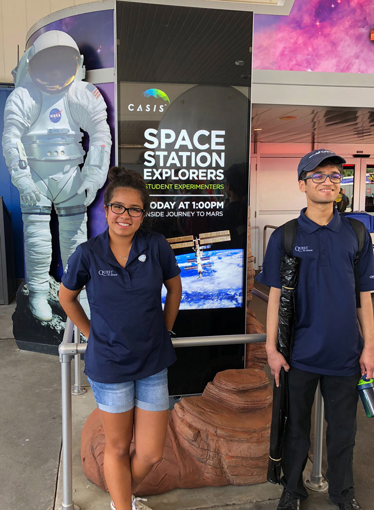4. Jaylene Baltazar and Mihir Kasmalkar from Valley Christian High School were excited to present their experiments on plant germination and growth in <span class=