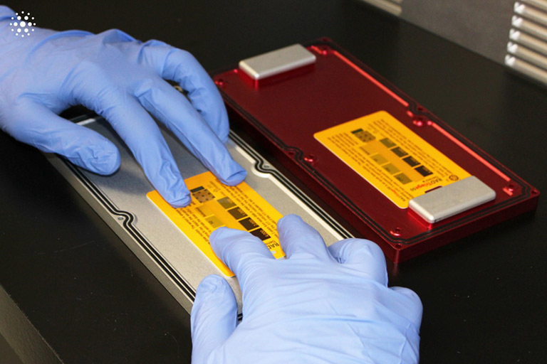 Both the ground control and flight CubeLab investigations are affixed with radiation sensor cards.
