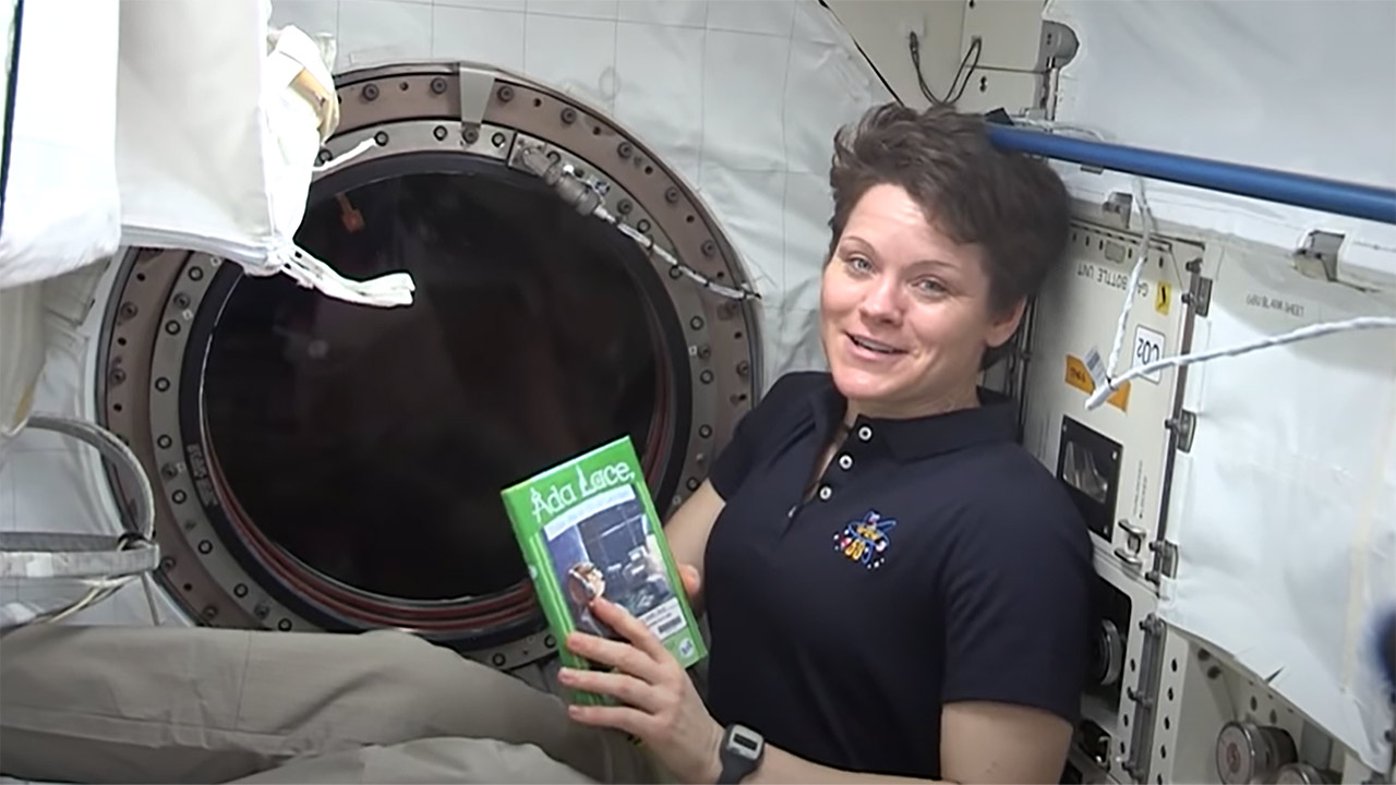 NASA astronaut Anne McClain reads Ada Lace