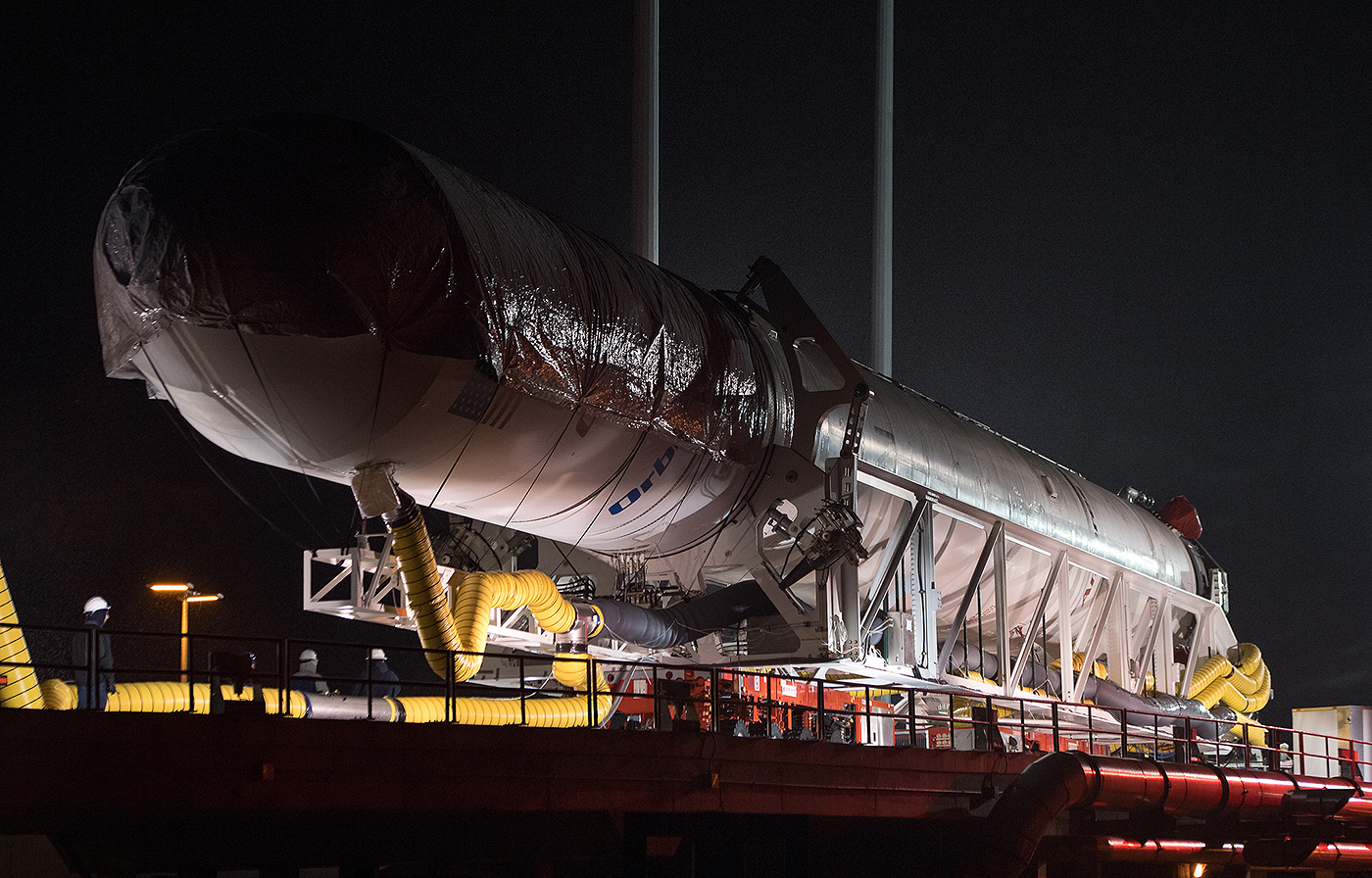 The Orbital ATK Antares rocket is rolled from the Horizontal Integration Facility (HIF) to launch Pad 0A, Thursday, Nov. 9, 2017 at NASAs Wallops Flight Facility in Virginia.