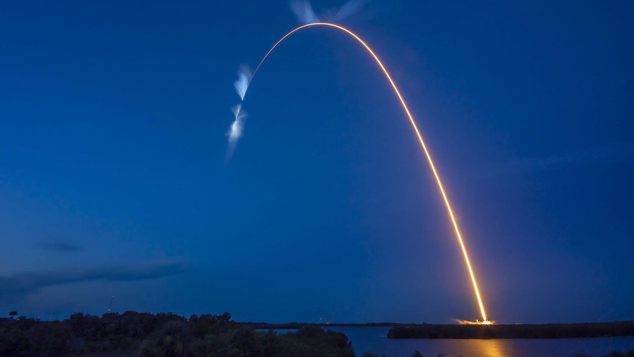 A bright white trail is in view after the SpaceX Falcon 9 rocket carrying the Dragon capsule lifts off from Launch Complex 39A at NASAs Kennedy Space Center in Florida on July 14, 2022, on the companys 25th Commercial Resupply Services mission for the agency to the International Space Station. Liftoff was at 8:44 p.m. EDT. Dragon will deliver more than 5,800 pounds of cargo, including a variety of NASA investigations, to the space station. The spacecraft is expected to spend about a month attached to the orbiting outpost before it returns to Earth with research and return cargo, splashing down off the coast of Florida. Date Created: 2022 07 14