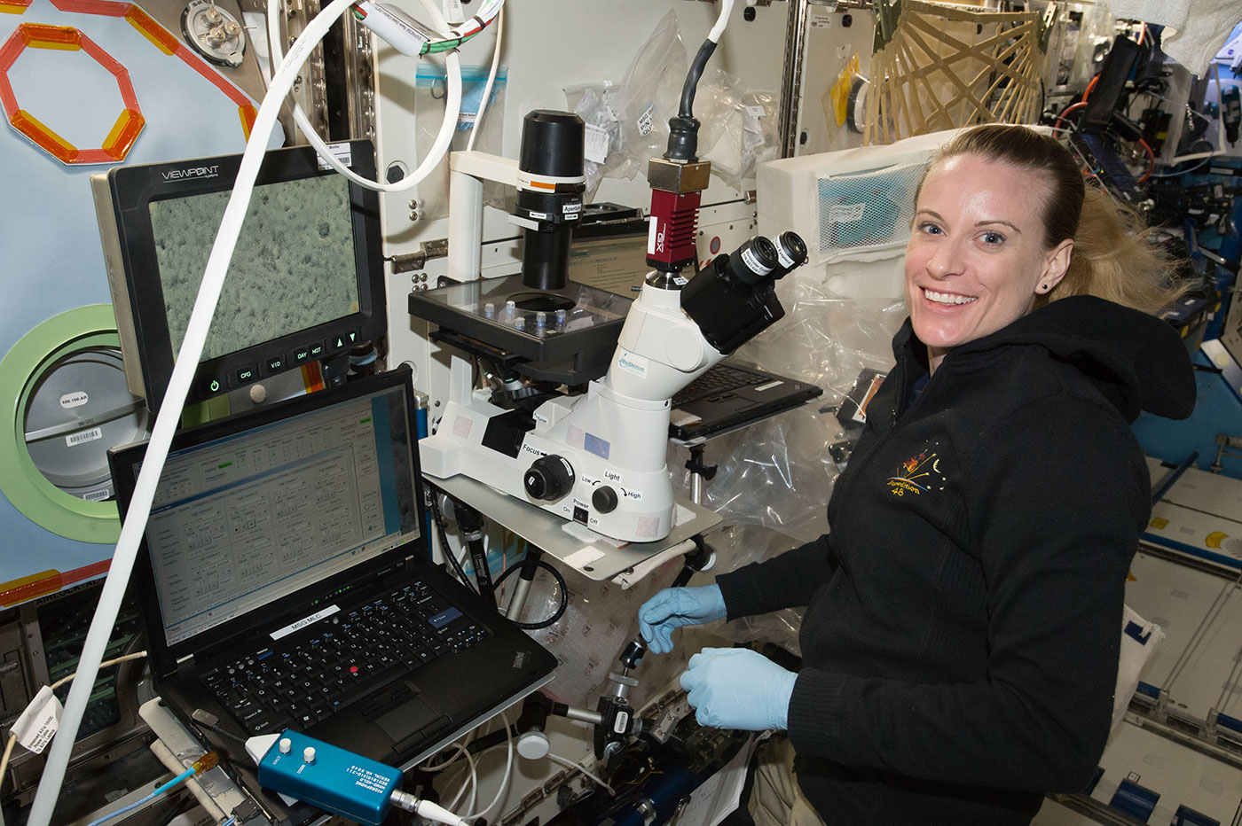 NASA astronaut Kate Rubins examines heart cells onboard the ISS as part of the Effects of Microgravity on Stem Cell Derived Heart Cells investigation.