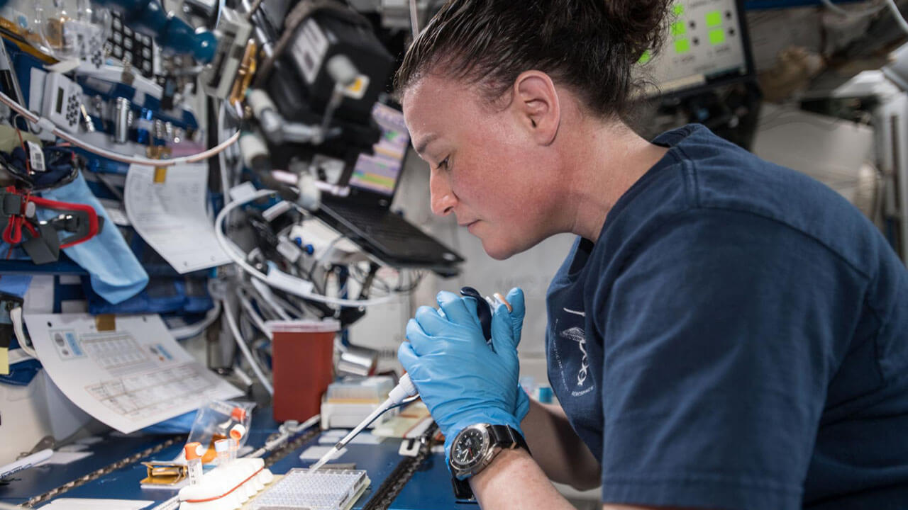 NASA astronaut Serena Aun Chancellor mixing protein crystal samples onboard the ISS. BioServe Protein Crystalography 1 seeks to demonstrate the feasibility of conducting protein crystal growth in real time on the space station. Crew members add solutions to the hardware, observe the crystals that form, and adjust for follow on experiments.