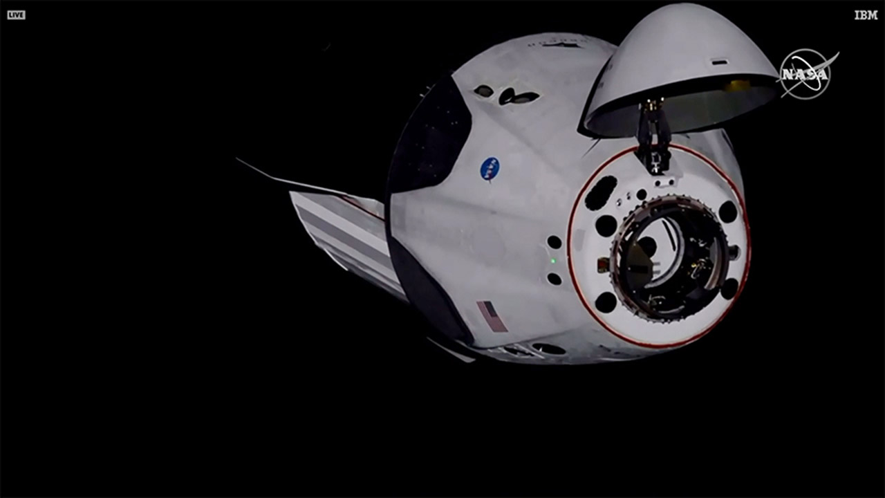 The SpaceX Crew Dragon is pictured about 30 meters away from the International Space Station.