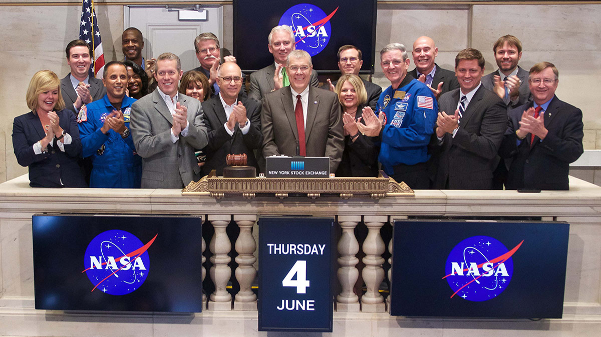 NASA officials and U.S. commercial space partners ring the closing bell at the New York Stock Exchange (NYSE) on Thursday, June 4, 2015. NASA is working with commercial industry to enable new research aboard the International Space Station that benefits humanity and stimulate other economic opportunities from spaceflight.