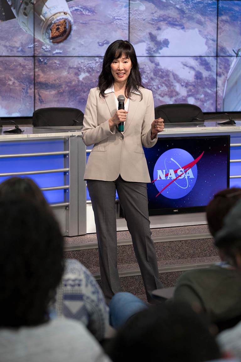 Dr. Chia Soo, principle investigator for Systemic Therapy of NELL 1 for Osteoporosis investigation, speaks to members of media in the Kennedy Space Centers Press Site.