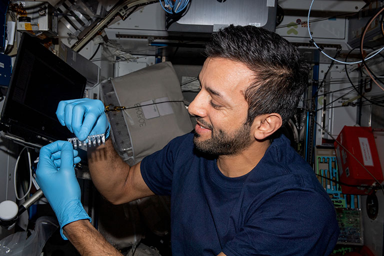 UAE astronaut Sultan Alneyadi performs the Genes in Space student experiment by Pristine Onuoha.