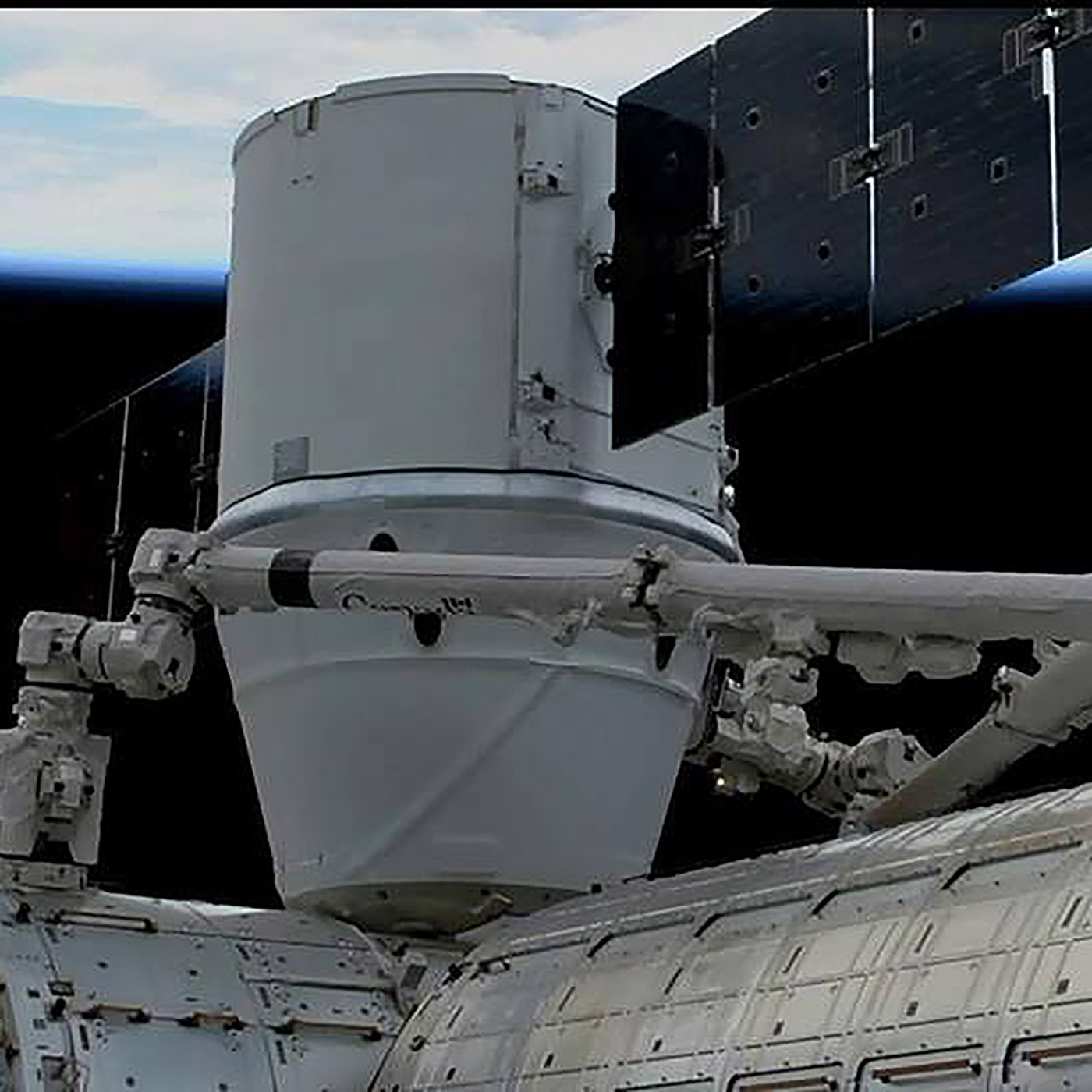 The SpaceX Dragon cargo vehicle was successfully installed on International Space Station at 8:26 a.m. EST, where it will stay until returning to Earth in January with results of previous experiments.