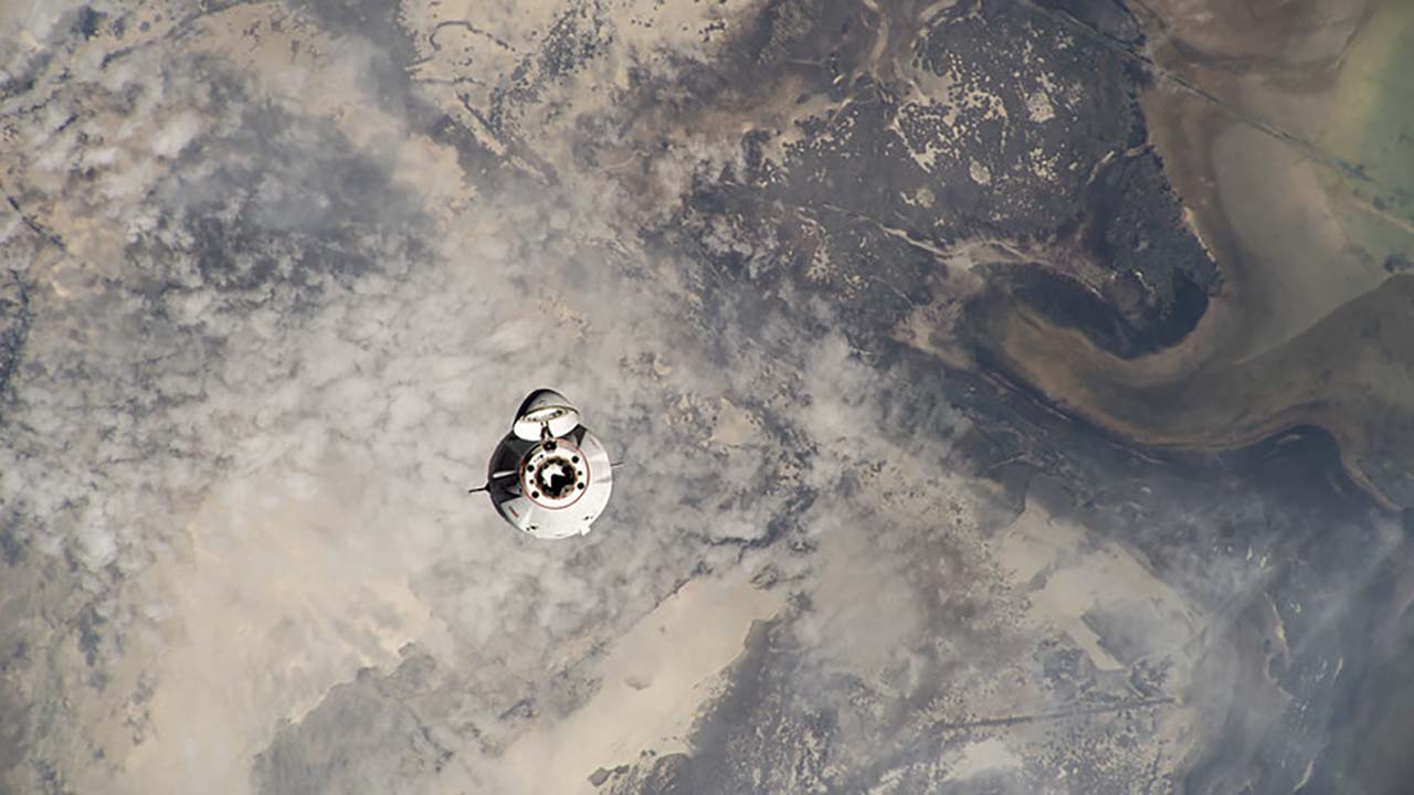 The SpaceX Dragon cargo vehicle approaches the International Space Station less than a day after launching from NASAs Kennedy Space Center back on June 6, 2023.