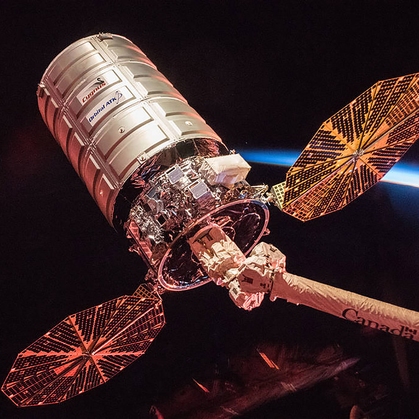 NASA astronaut Randy Bresnik photographed Orbital ATKs Cygnus cargo spacecraft at sunrise, prior to its departure from the International Space Station at 8:11 a.m., Dec. 6, 2017.