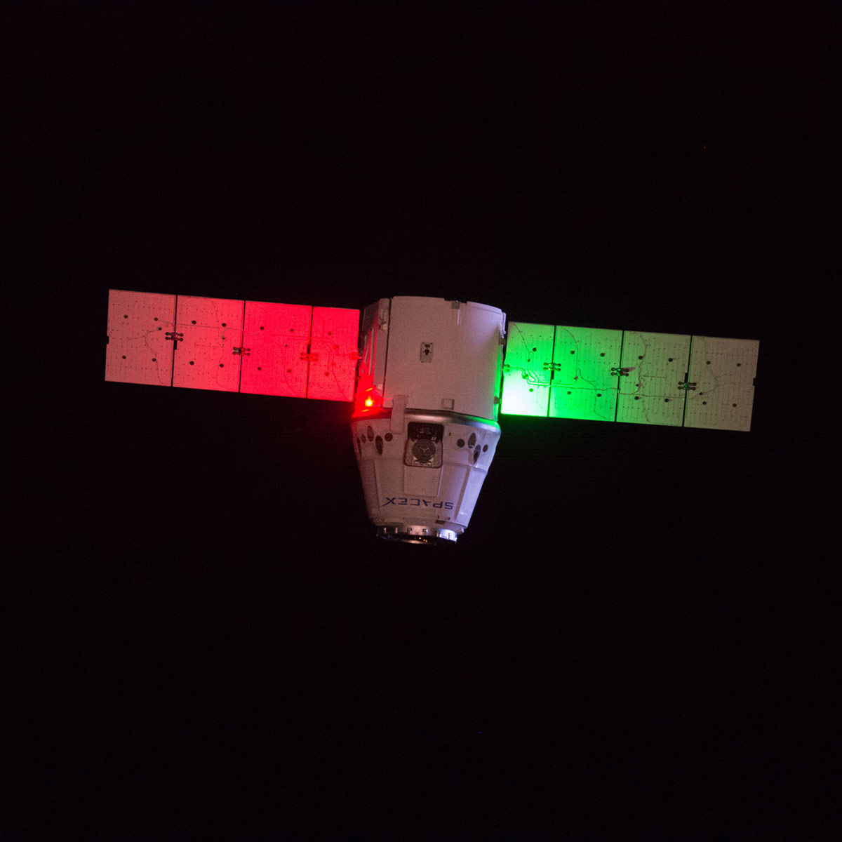 The SpaceX Dragon commercial cargo craft approaches the Canadarm2 robotic arm as it prepares to dock with the International Space Station on February 23, 2017. The spacecraft was delivering 5500 pounds of supplies to the orbiting space laboratory.