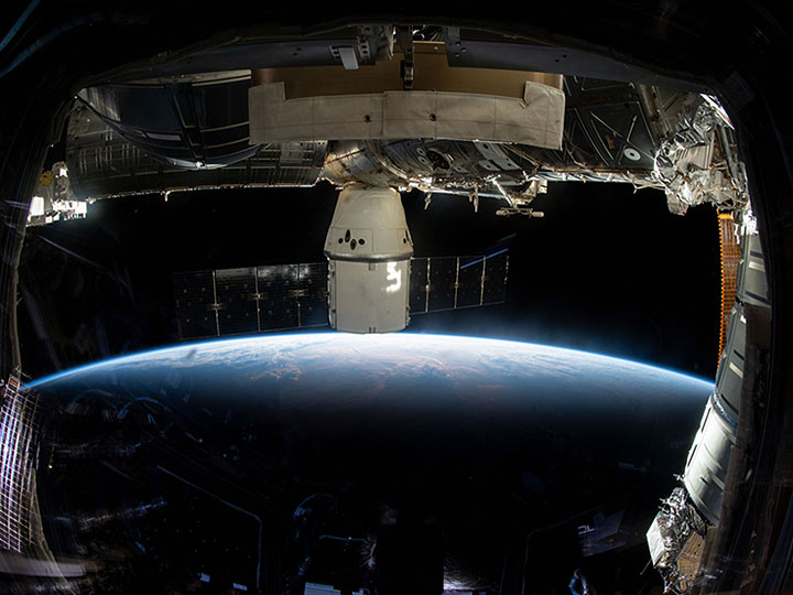 The SpaceX Dragon cargo craft is pictured attached to the International Space Station almost 257 miles above Quebec on New Years Eve 2018.