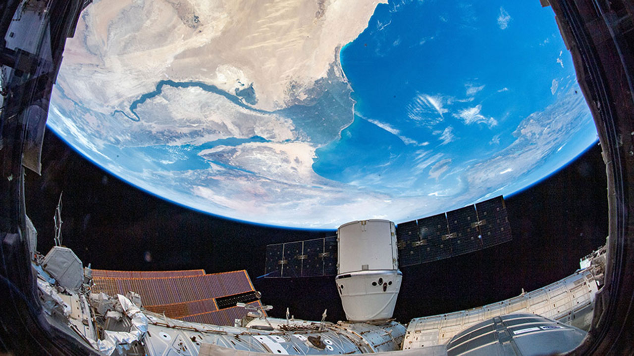The SpaceX Dragon resupply ship is pictured attached to the International Space Stations Harmony module on Aug. 13, 2019, as the orbital complex flew 260 miles above the Nile River Delta in Egypt.
