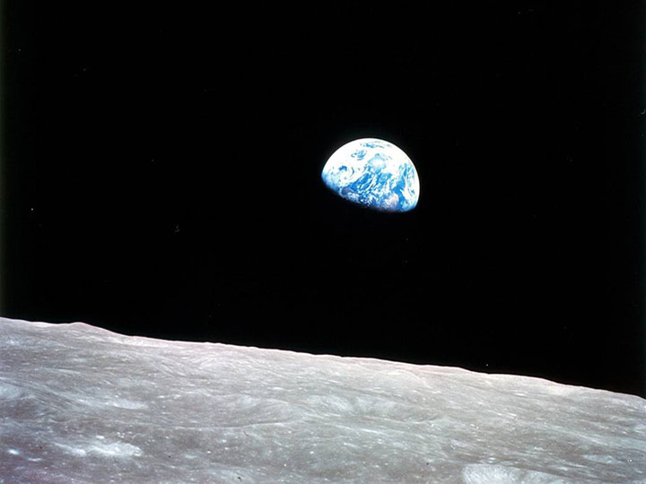 Apollo 8, the first manned mission to the moon, entered lunar orbit on Christmas Eve, Dec. 24, 1968. That evening, the astronauts Commander Frank Borman, Command Module Pilot Jim Lovell, and Lunar Module Pilot William Anders held a live broadcast from lunar orbit, in which they showed pictures of the Earth and moon as seen from their spacecraft. Said Lovell, The vast loneliness is awe inspiring and it makes you realize just what you have back there on Earth. They ended the broadcast with the crew taking turns reading from the book of Genesis.