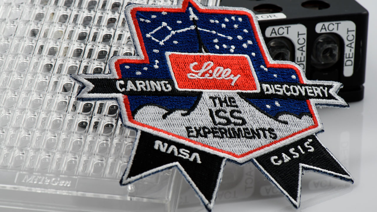Mission patch and the PCG investigation hardware.