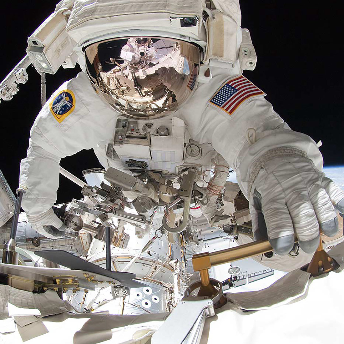 NASA astronaut Greg Chamitoff conducting extravehicular activity (EVA) on the International Space Station, 2011.