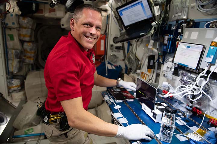 Bob Hines performs the Genes in Space 9 student experiment.