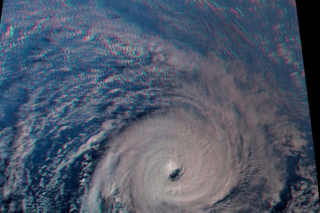 This is Tropical Cyclone Gita on February 13, 2018, not long after this Category 3 storm had passed Fiji. This view, which covers an area of 1,500 kilometers by 1,000 kilometers (930 miles by 620 miles), shows the spiral bands of the storm wrapping around a clearly visible eye. But unlike storms in the northern hemisphere that rotate counterclockwise, this southern hemisphere storm rotates clockwise! Large storms rotate because of the Coriolis effect, which results from Earths west to east rotation and spherical shape. Moving fluids (especially air) are deflected to the right in the northern hemisphere and to the left in the southern hemisphere. If Earth werent rotating, storms would move in straight lines and their bands of clouds would be shaped like straight spokes instead of spirals.