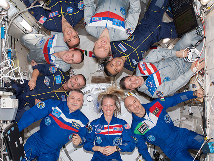Nine crew members gather for a group portrait in the International Space Stations Kibo laboratory following a joint crew news conference. Pictured clockwise (from bottom right) are European Space Agency astronaut Luca Parmitano and NASA astronaut Karen Nyberg, both Expedition 37 flight engineers; Russian cosmonaut Fyodor Yurchikhin, Expedition 37 commander; Russian cosmonaut Mikhail Tyurin, Russian cosmonaut Sergey Ryazanskiy, NASA astronaut Rick Mastracchio, Expedition 38 flight engineers; Russian cosmonaut Oleg Kotov, Expedition 38 commander; Japan Aerospace Exploration Agency astronaut Koichi Wakata and NASA astronaut Michael Hopkins, both Expedition 38 flight engineers.