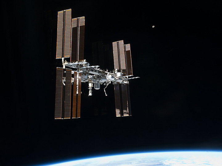 iss dark tiny moon background