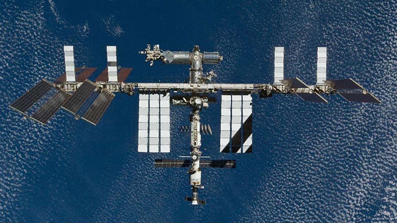 iss full blue clouds