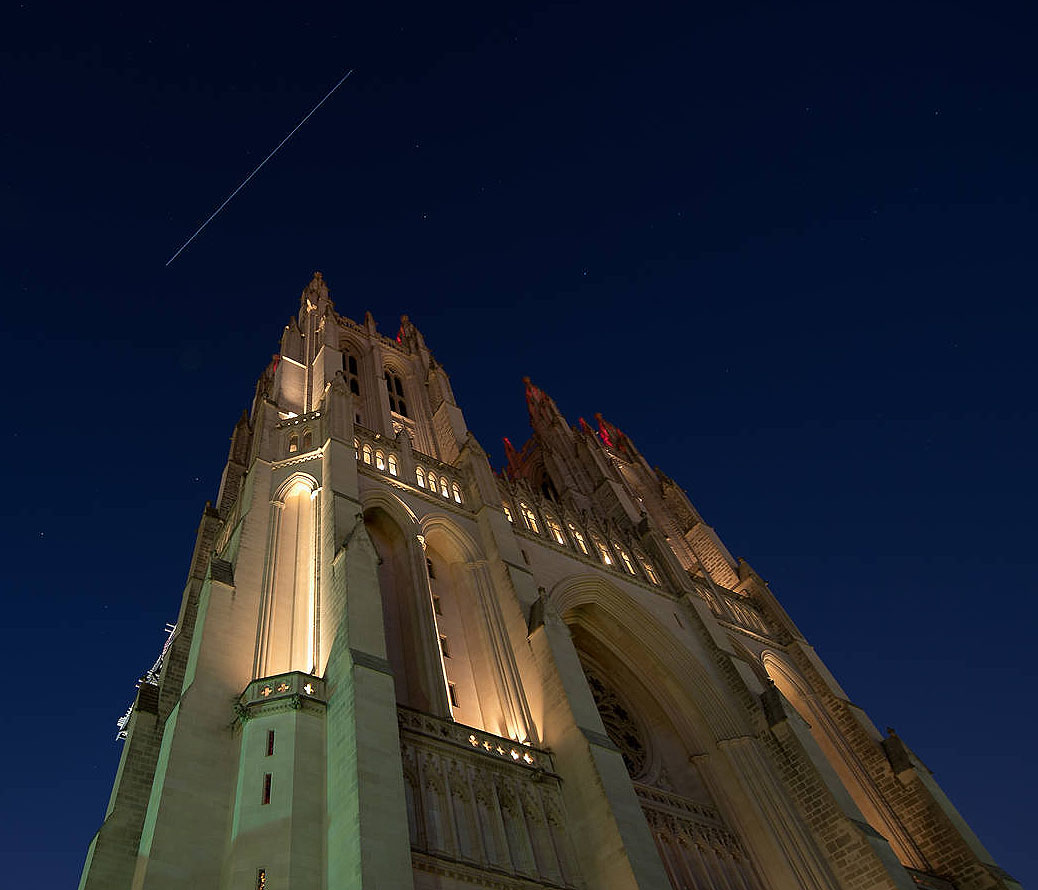 The International Space Station is seen in this twenty second exposure as it flies over the Washington National Cathedral, Wednesday, Nov. 29, 2017. Onboard are: NASA astronauts Joe Acaba, Mark Vande Hei, and Randy Bresnik; Russian cosmonauts Alexander Misurkin and Sergey Ryanzansky; and ESA astronaut Paolo Nespoli. Photo Credit: (NASA Bill Ingalls)