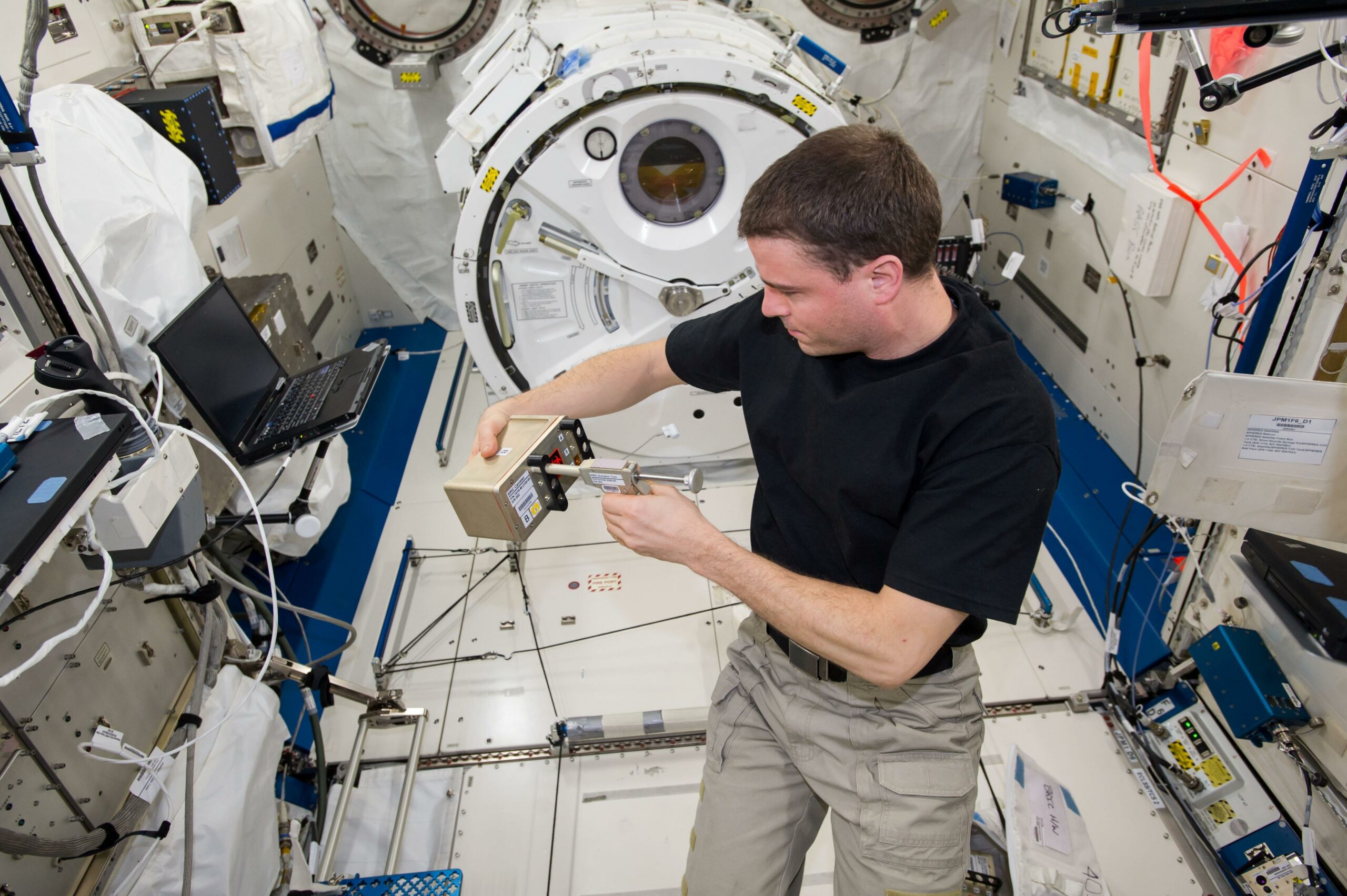 NASA astronaut Reid Wiseman during Biological Research In Canisters 19 (BRIC 19) actuation. BRIC 19 studies changes in gene activity, growth, and development of Arabidopsis thaliana (thale cress) seedlings germinated in space, comparing them to plants grown on Earth.