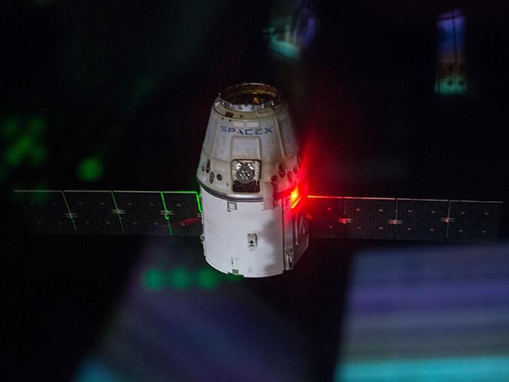 View of SpaceX Dragon CRS during undocking. Photo was taken during Expedition 41.