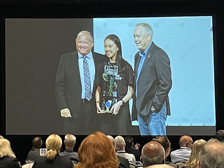2023 Genes in Space competition winner Isabel Jiang, a high school student from Hillsborough, CA, receives her award at ISSRDC 2023.